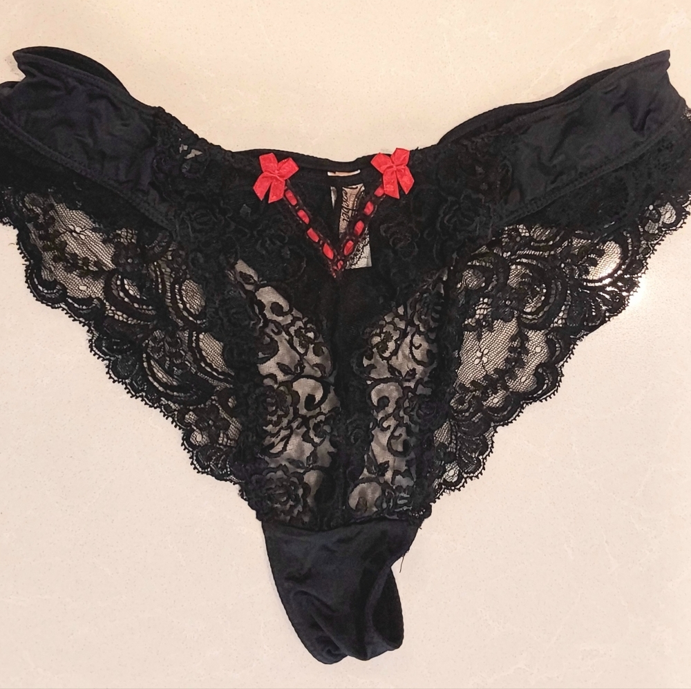 Jezebel black thong with full front coverage